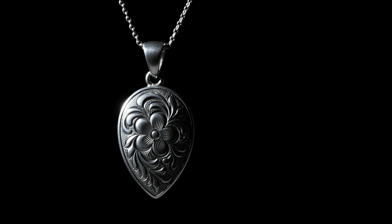Engraved silver pendant